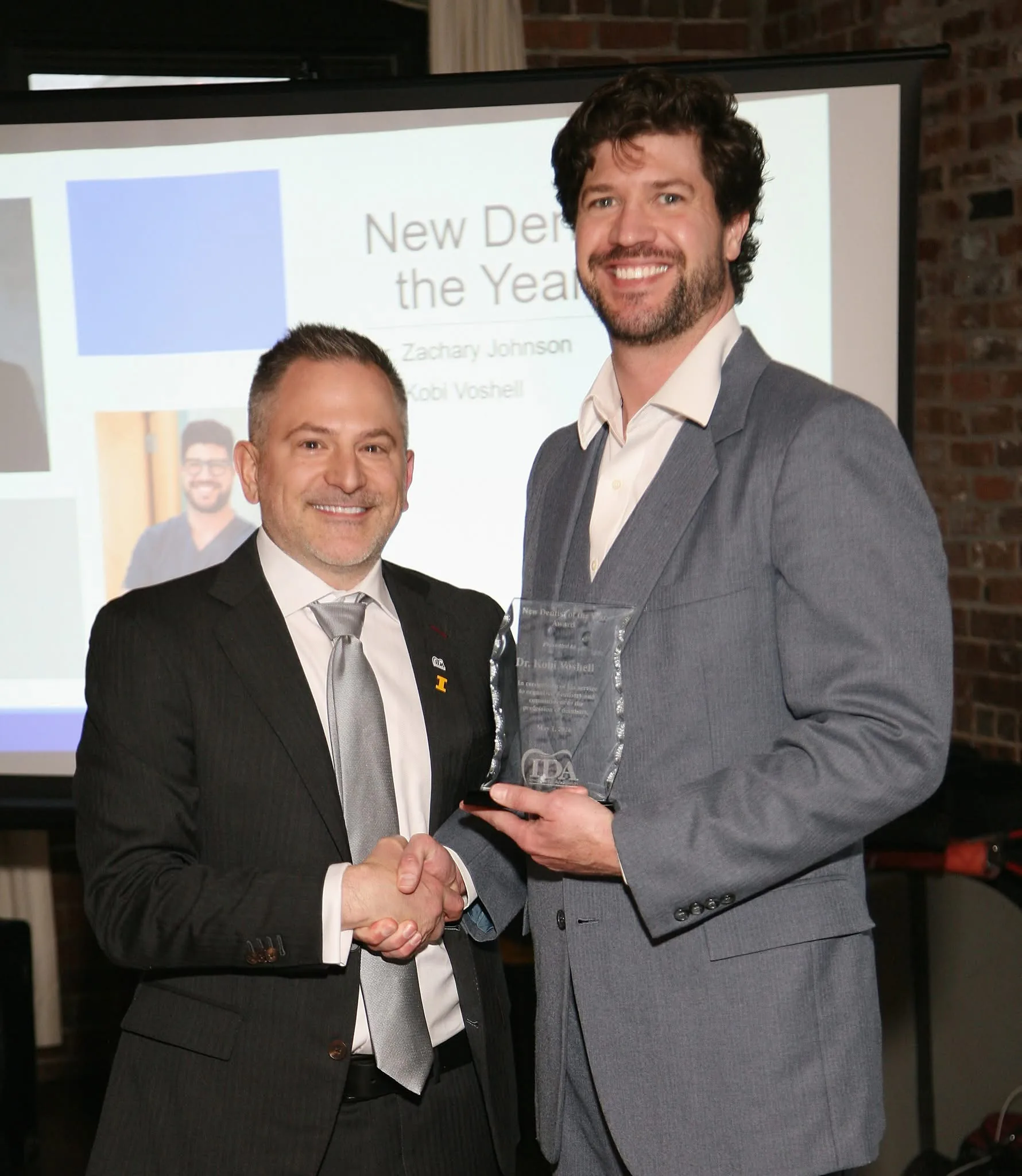 Dr. Voshell receiving the Iowa Dental Association New Dentist of the Year award
